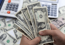 El dólar cerró a $1460 en el Banco Nación mientras las acciones suben hasta 50%