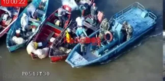Piquete de pescadores malloneros en el río